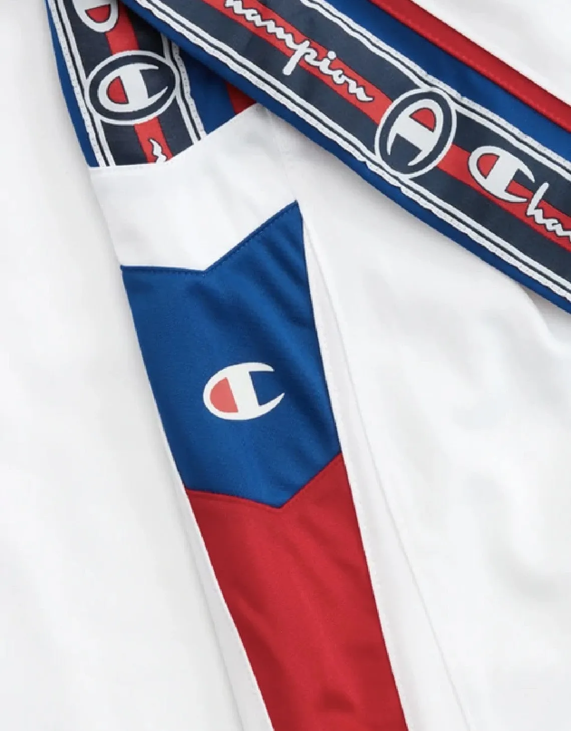 CHAMPION EUROPE<br>ARCHIVE JACQUARD LOGO TAPE TRACK PANTS WHITE